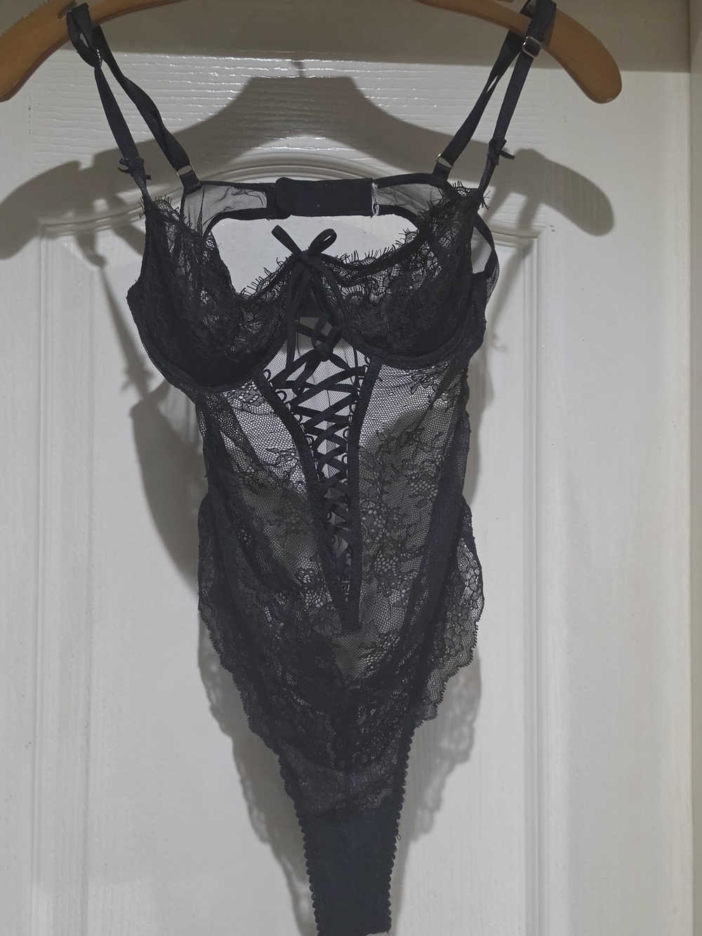 Lace-Up Sheer Lace Bodysuit in Black
